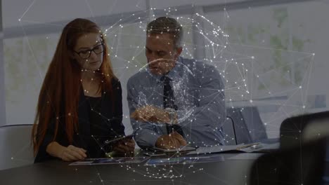 Animation-of-connections-with-globe-over-caucasian-woman-and-man-in-office