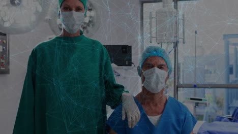 Animation-of-network-of-connections-over-caucasian-male-and-female-surgeons-at-hospital
