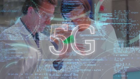 5g-text-and-data-processing-against-caucasian-male-and-female-scientists-working-at-laboratory
