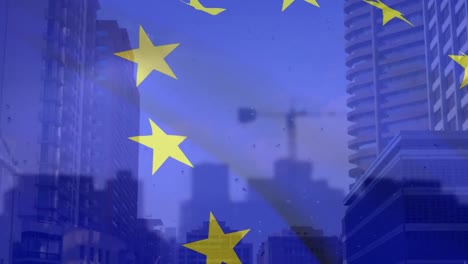 Composite-video-of-european-union-flag-waving-against-tall-buildings