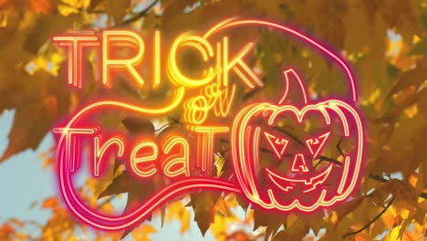 Animation-of-trick-or-treat-text-over-leaves