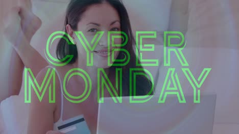 Animation-of-cyber-monday-over-happy-caucasisn-woman-doing-online-shopping