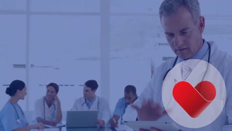 Animation-of-falling-hearts-icons-over-diverse-group-of-doctors