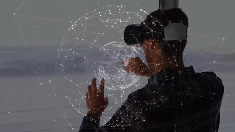 Animation-of-network-of-connections-over-caucasian-businessman-using-vr-headset