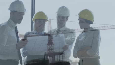Animation-of-building-site-over-caucasian-business-people-talking