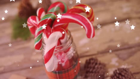 Animation-of-stars-over-christmas-sweets