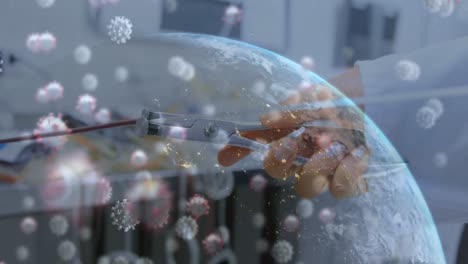 Animation-of-virus-cells-and-globe-over-hand-with-lab-equipment