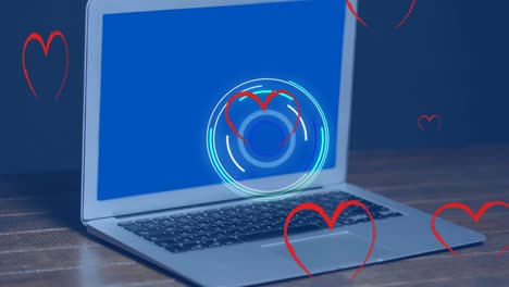 Animation-of-hearts-falling-over-laptop-with-copy-space