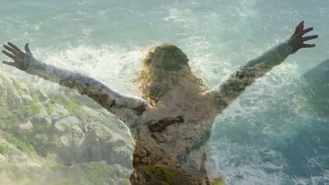 Animation-of-back-view-of-caucasian-woman-with-spread-arms-over-ocean-waves