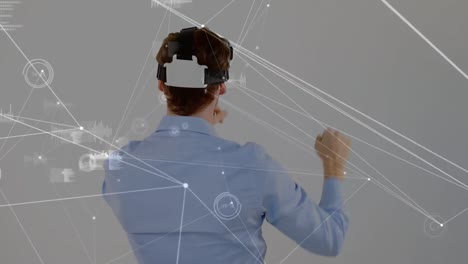 Animation-of-data-processing-over-caucasian-man-using-vr-headset