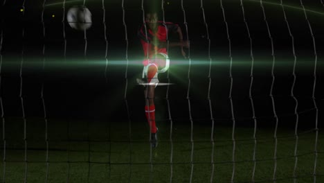 Animation-of-light-spots-over-african-american-male-soccer-player