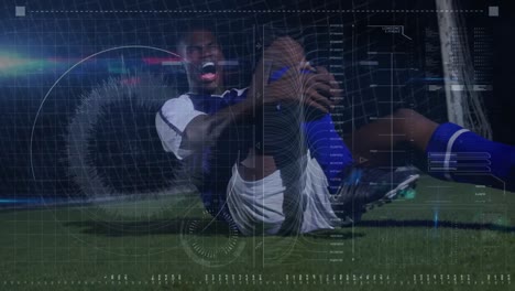 Animation-of-data-processing-over-african-american-male-soccer-player-having-contusion