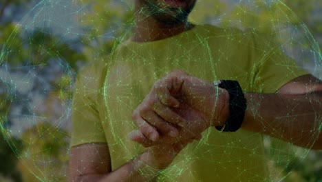 Animation-of-network-of-connections-over-biracial-man-using-smartwatch