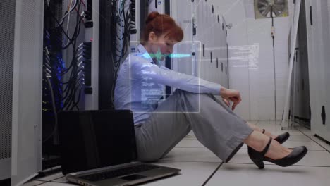 Multiple-screens-with-data-processing-against-caucasian-female-engineer-sitting-in-server-room