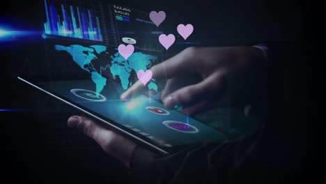 Animation-of-hearts-floating-over-hands-of-caucasian-man-using-tablet-with-world-map-and-graphs