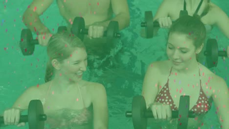 Animation-of-confetti-falling-over-happy-caucasian-women-and-man-exercising-with-weights-in-pool