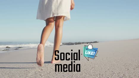 Animation-of-social-media-text-and-icon-over-caucasian-woman-walking-on-beach