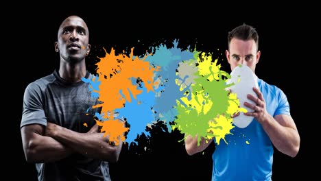Animation-of-stains-over-diverse-rugby-players-on-black-background