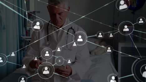 Animation-of-network-of-connections-over-caucasian-senior-male-doctor-with-notes