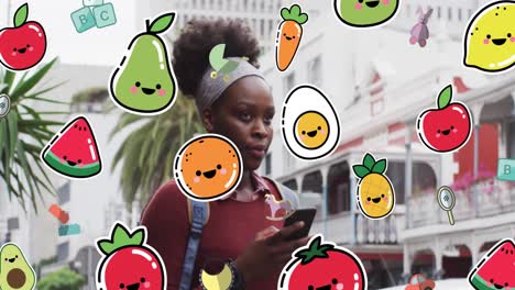 Animation-Von-Essens--Und-Spielzeugsymbolen-über-Einer-Afroamerikanischen-Frau,-Die-Ihr-Smartphone-Nutzt