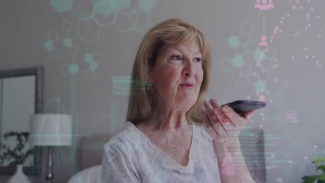Animation-of-chemical-formula-and-data-processing-over-senior-caucasian-woman-talking-on-smartphone