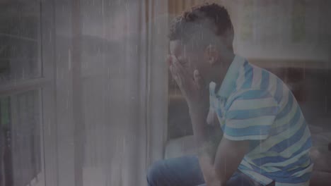 Animation-Des-Regens-über-Einem-Traurigen-Afroamerikanischen-Jungen