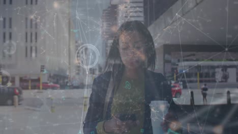 Animation-of-network-of-connections-against-african-american-businesswoman-using-smartphone