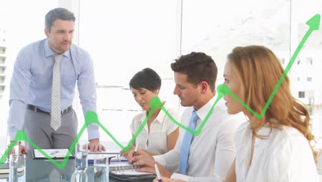 Green-graph-moving-over-diverse-businesspeople-discussing-in-meeting-room-at-office
