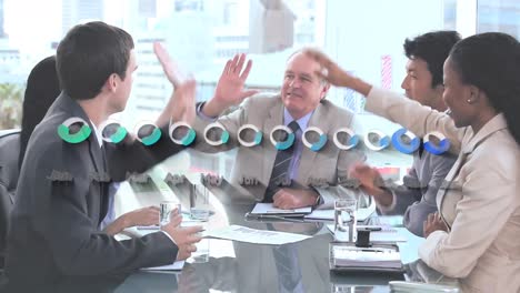 Statistical-data-processing-over-diverse-businesspeople-high-fiving-each-other-at-office