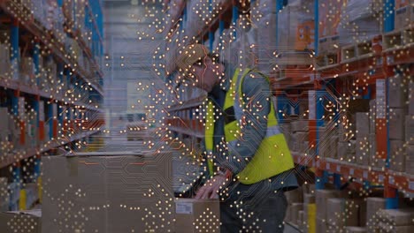 Animation-of-network-of-connections-over-caucasian-male-worker-in-warehouse
