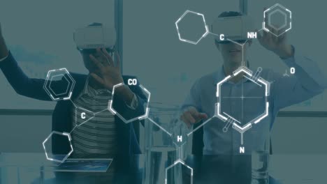 Animation-of-chemical-formulas-over-two-diverse-people-using-vr-headsets