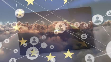 Animation-Von-Sternen-Der-Europäischen-Union-über-Verbindungen,-Wolken-Und-Windkraftanlagen-Bei-Sonnenuntergang