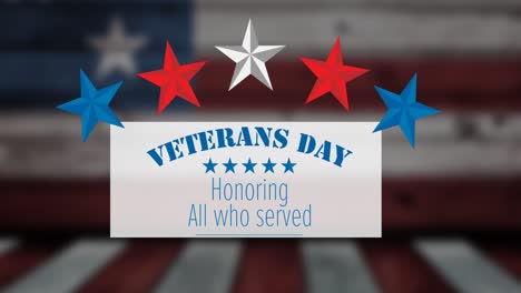 Animation-of-veterans-day-text-and-usa-flag-over-dark-background