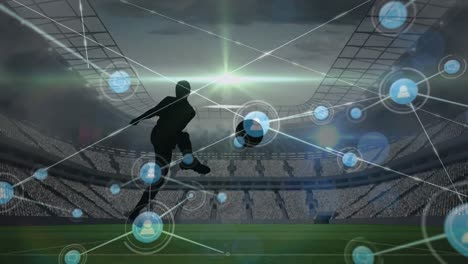 Animation-of-connections-over-male-soccer-player-silhouette-at-stadium