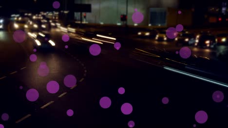 Animation-of-purple-dots-moving-over-blurred-night-cityscape