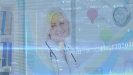 Animation-of-data-processing-over-happy-caucasian-senior-female-doctor
