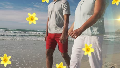Animation-of-falling-flowers-over-caucasian-senior-couple-on-the-beach