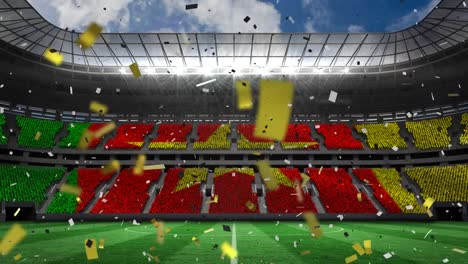 Animation-of-flag-of-cameroon-and-confetti-falling-over-sport-stadium