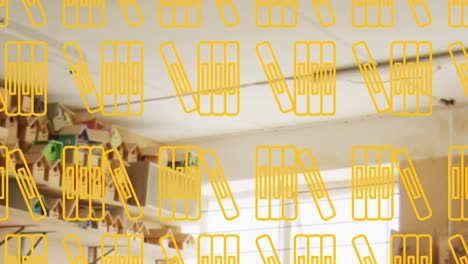 Animation-of-yellow-books-floating-over-classroom