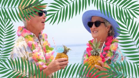 Animation-of-moving-leaves-over-caucasian-senior-couple-on-the-beach