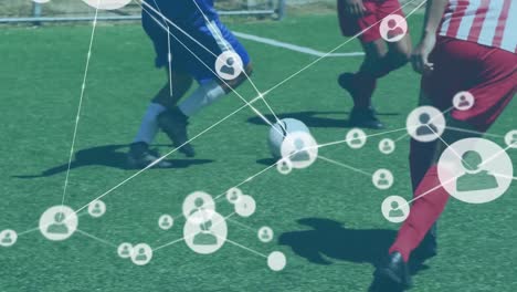 Animation-of-network-of-connections-over-diverse-male-soccer-players-training-on-field