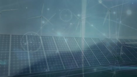 Animation-of-network-of-connections-over-solar-panels-and-wind-turbines
