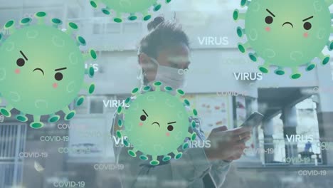 Animation-of-virus-cells-over-biracial-woman-with-face-mask-using-smartphone