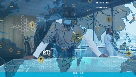 Animation-of-world-map-and-icons-over-african-american-man-in-vr-headset-in-office