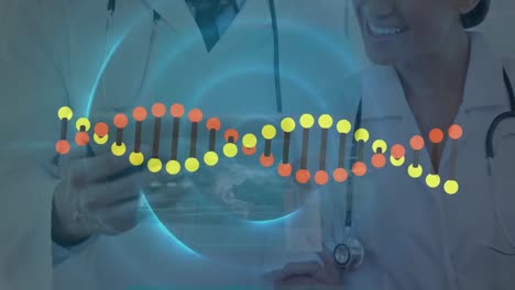 Animation-of-dna-and-circles-over-happy-diverse-female-and-male-doctors