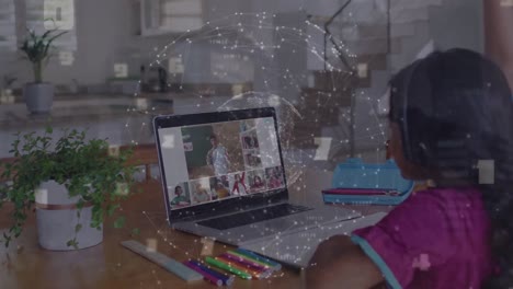 Animation-of-globe-of-connections-over-biracial-girl-using-laptop-for-online-school-lesson