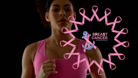 Animation-of-breast-cancer-awareness-month-text-over-biracial-woman-running