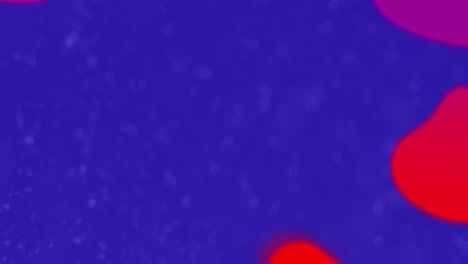 Animation-of-blue,-red-and-purple-globules-moving-on-blue-background