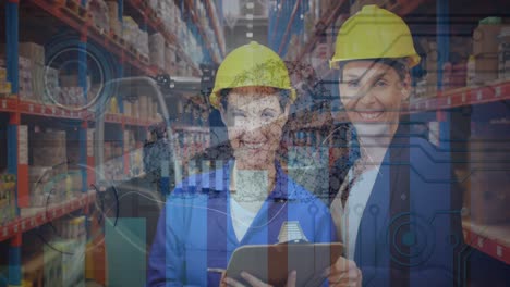 Animation-of-graphs-and-data-over-happy-caucasian-female-warehouse-workers