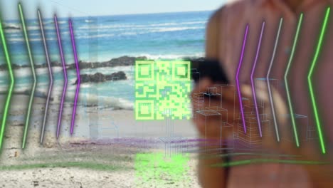 Animation-of-qr-code,-digital-lines-with-skyscrapers-over-caucasian-woman-using-phone-at-beach